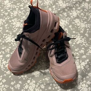 On Running Light Purple and Orange Athletic Shoes